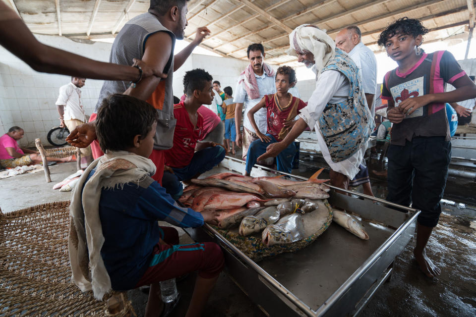 <p>Fish market, Al Hudaydah, Yemen, April 17, 2017: The fishery sector has been heavily impacted by the conflict in Yemen. Productivity has decreased by 50 percent and 65 percent of fishermen have lost their jobs. (Photograph by Giles Clarke for UN OCHA/Getty Images) </p>