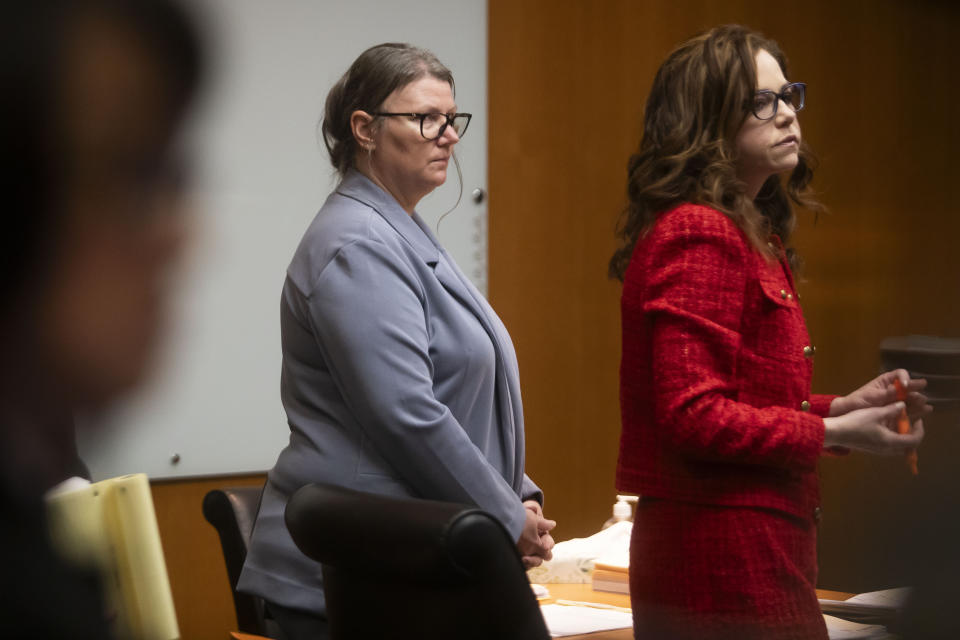 Defendant Jennifer Crumbley, left, and her defense attorney, Shannon Smith, right, listen during Crumbley's trial at the Oakland County Courthouse on Wednesday, Jan. 31, 2024, in Pontiac, Mich. Crumbley is charged with involuntary manslaughter. (Katy Kildee/Detroit News via AP, Pool)