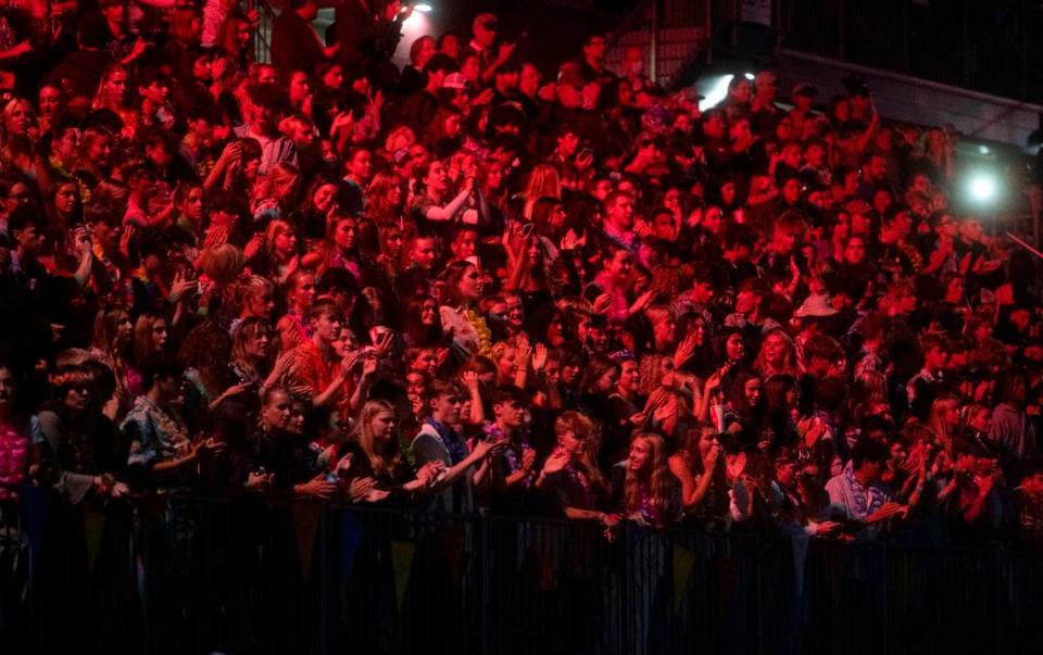 The State College student section glows red as the team is in the red zone during the game against Altoona on Friday, Sept. 15, 2023.