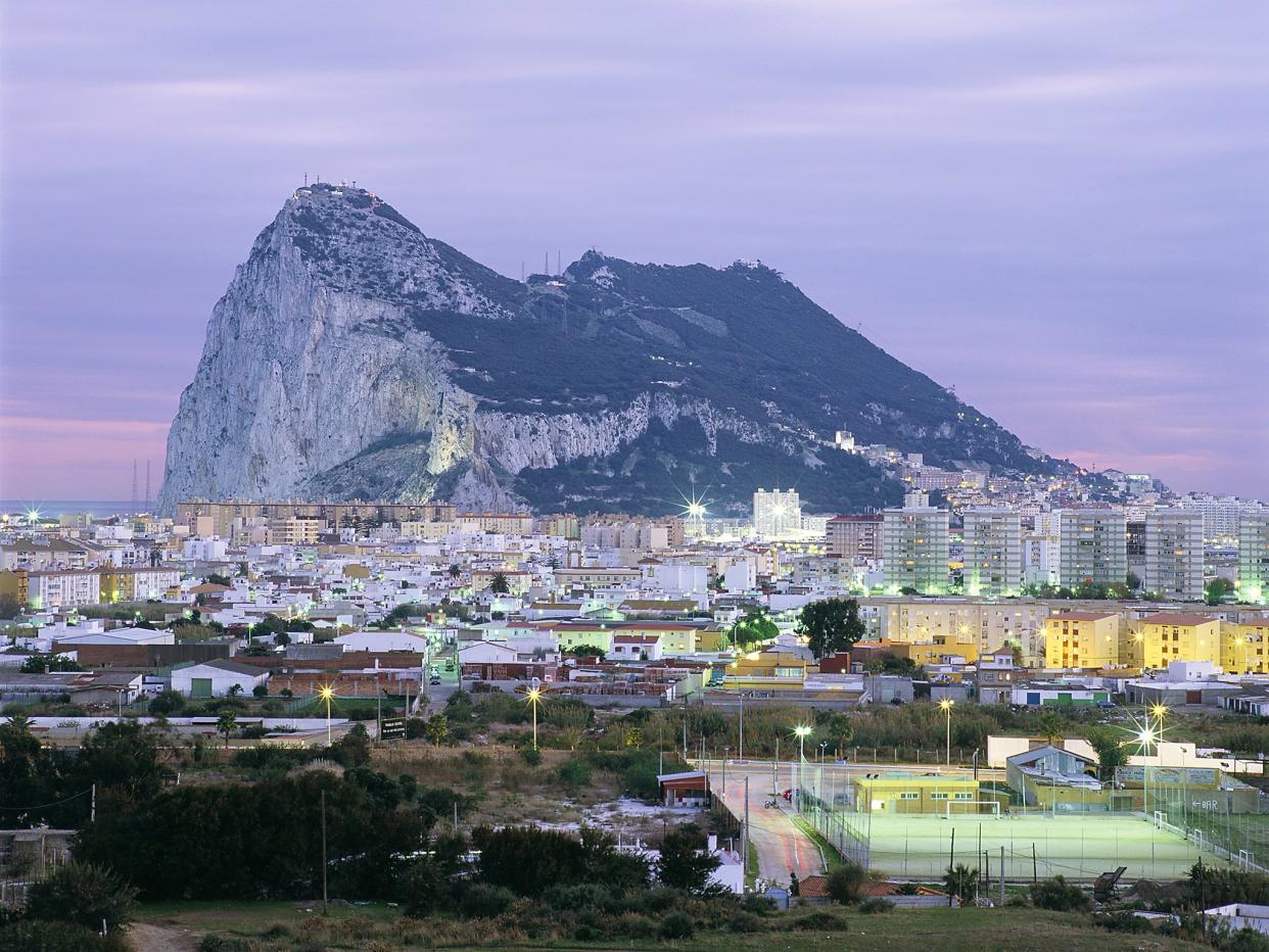 La Línea, seen here in the foreground with the Rock of Gibraltar behind, has lost three generations of young people to drug trafficking, according to Francisco Mena: Reuters