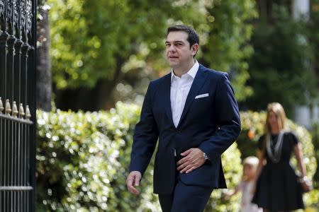 Greek Prime Minister Alexis Tsipras leaves the Presidential Palace following the swearing-in ceremony of his government in Athens, Greece, September 23, 2015. REUTERS/Alkis Konstantinidis