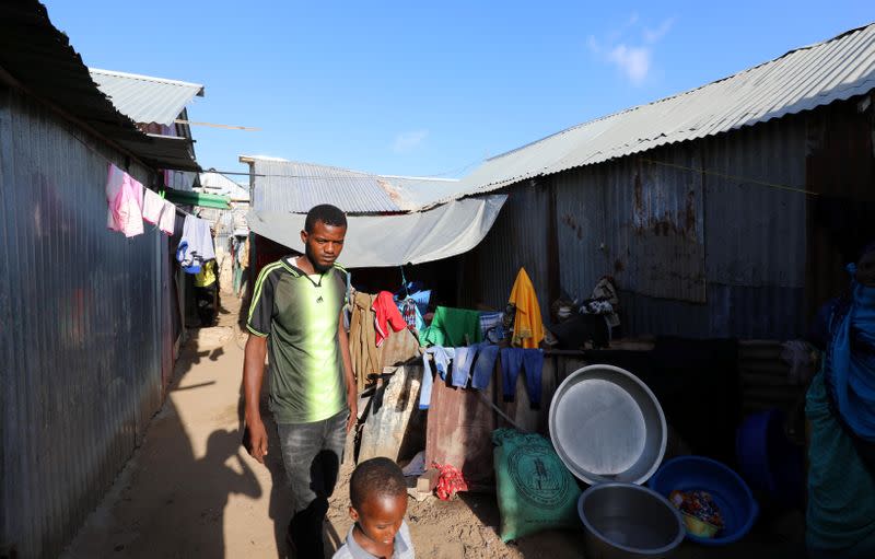 Somali farmer Abdi Abukar Hassan is seen during a Reuters interview outside his house in Mogadishu