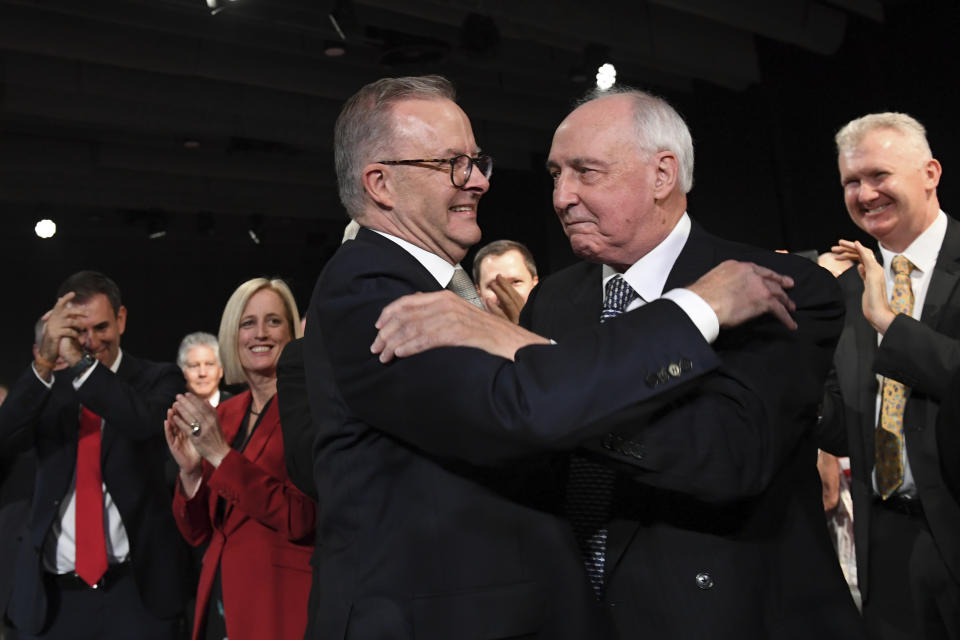 Australian opposition leader Anthony Albanese, center right, is met by former Australian prime minister Paul Keating, before addresses the crowd during the Labor Party campaign launch in Perth, Sunday, May 1, 2022. Australia will have a national election on May 21. (Lukas Coch/AAP Image via AP)