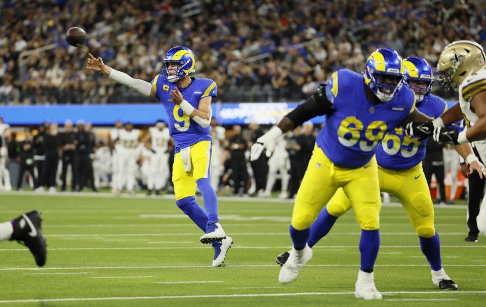 Rams quarterback Matthew Stafford (9) passes against the Saints.