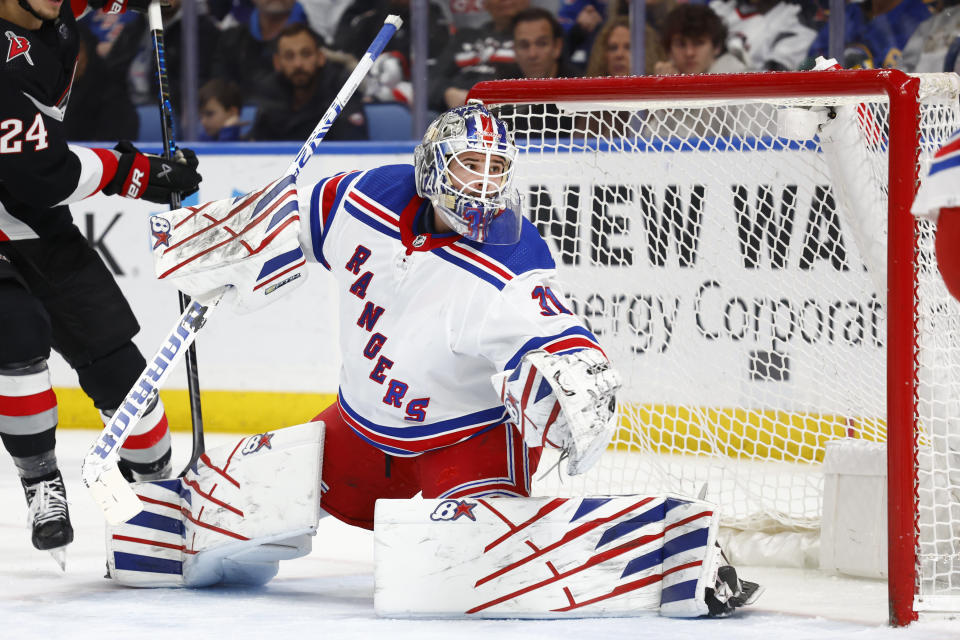 New York Rangers goaltender Igor Shesterkin (31) slides across the crease during the first period of an NHL hockey game against the Buffalo Sabres, Saturday, March 11, 2023, in Buffalo, N.Y. (AP Photo/Jeffrey T. Barnes)