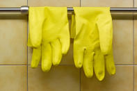 <div class="caption-credit">Photo by: Shutterstock</div><div class="caption-title">Rubber Gloves</div>To keep your own home from becoming fur-lined and dander-ridden, the trick is simple: Dampen a pair of rubber gloves, and rub them over all upholstered surfaces. No chemicals, no waste, and very little precious time spent. Rinse the gloves (be careful not to clog your drain!) and store them until Fido's next romp around the living room. <br>