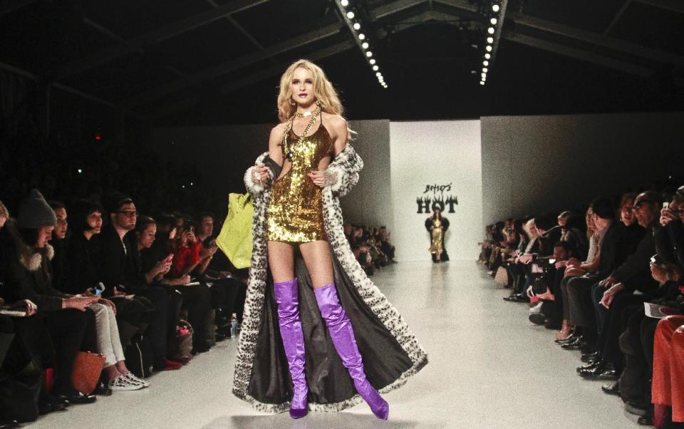 Fashion from the Betsey Johnson Fall 2014 collection is modeled during New York Fashion Week on Wednesday, Feb. 12, 2014. (AP Photo/Bebeto Matthews)