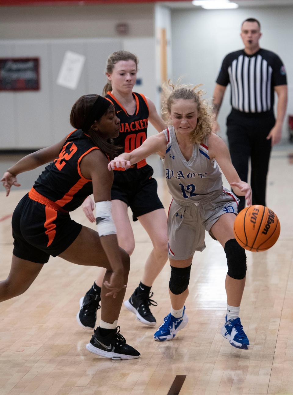 Pace High School's Alyssa Clark drives past McGill Toolen's defense during Monday's Gulf Coast MLK Dream Keeper Showcase at West Florida High School on Monday, Jan. 17, 2022.