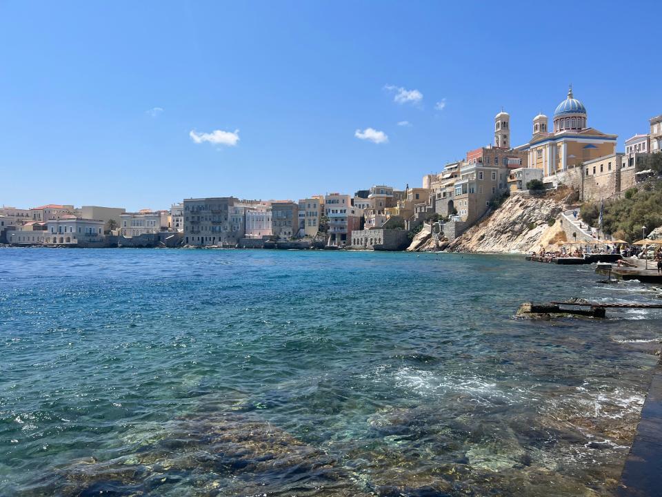 view of ciel beach and the coast of syros greece