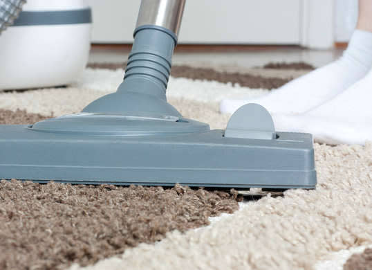 <p>It’s obvious that vacuuming keeps your carpets clean, but this common chore is also the key to ensuring they stay looking like new. Dirt has abrasive qualities, and when it’s repeatedly ground into the carpet by everyday foot traffic, it can actually erode the backing over time. Vacuuming once a week (twice a week in busy areas) can remove up to 75 percent of the <a href="http://www.bobvila.com/slideshow/15-remarkably-easy-ways-to-create-a-dust-free-home-47177" rel="nofollow noopener" target="_blank" data-ylk="slk:dirt and debris" class="link ">dirt and debris</a> and prevent your carpet from aging before its time. <i>Photo: fotosearch.com</i><b><br>RELATED: <a href="http://www.bobvila.com/slideshow/10-cleaning-habits-to-blame-for-your-messy-home-49360" rel="nofollow noopener" target="_blank" data-ylk="slk:10 Cleaning Habits to Blame for Your Messy Home" class="link ">10 Cleaning Habits to Blame for Your Messy Home</a></b></p>