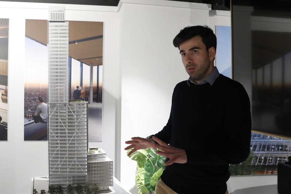 Kevin Darvishi leasing Director for the 8 Bishopsgate development speaks to the Associated Press at their marketing suite in London, Thursday, April 1, 2021. Darvishi said demand for top-quality office buildings will remain strong in the post-pandemic world.(AP Photo/Alastair Grant)