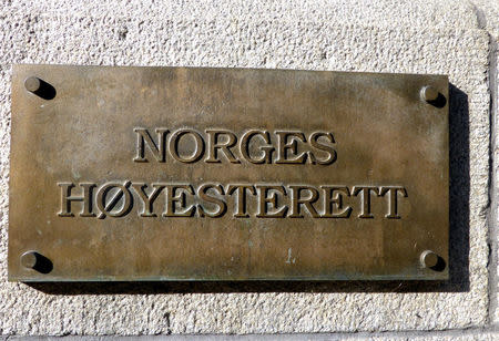 A sign of the Norwegian Supreme Court is seen on the court's building in Oslo, Norway May 23, 2018. REUTERS/Gwladys Fouche