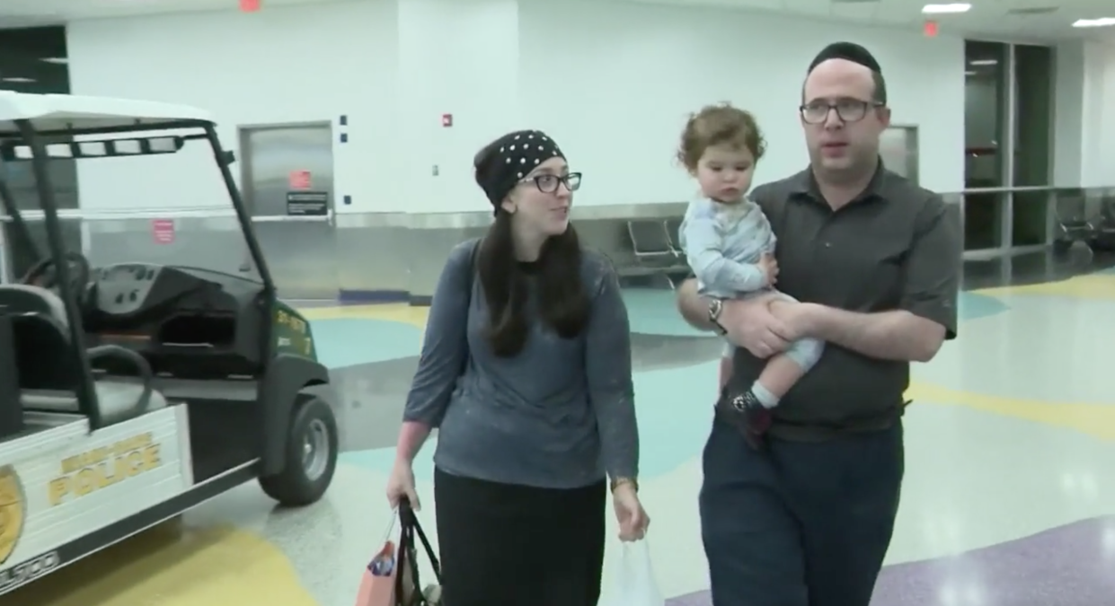 American Airlines booted Yossi and Jennie Adler and their 19-month-old daughter from a Miami flight because of their alleged body odor. (Photo: Screenshot via WPLG)