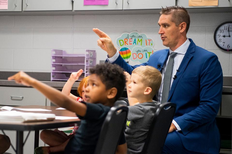 Knox County Schools Superintendent Jon Rysewyk watches Monday as elementary students work on summer reading exercises at Christenberry Elementary in Knoxville.