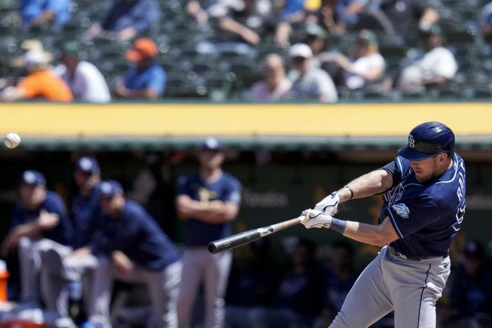 Tampa Bay Rays' Luke Raley hits a solo home run against the Oakland Athletics during the eighth inning of a baseball game in Oakland, Calif., Thursday, June 15, 2023. (AP Photo/Godofredo A. Vásquez)