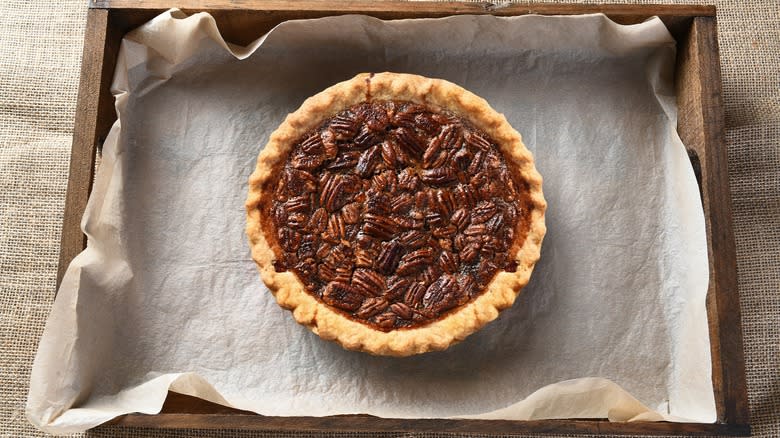 baked pecan pie cooling down