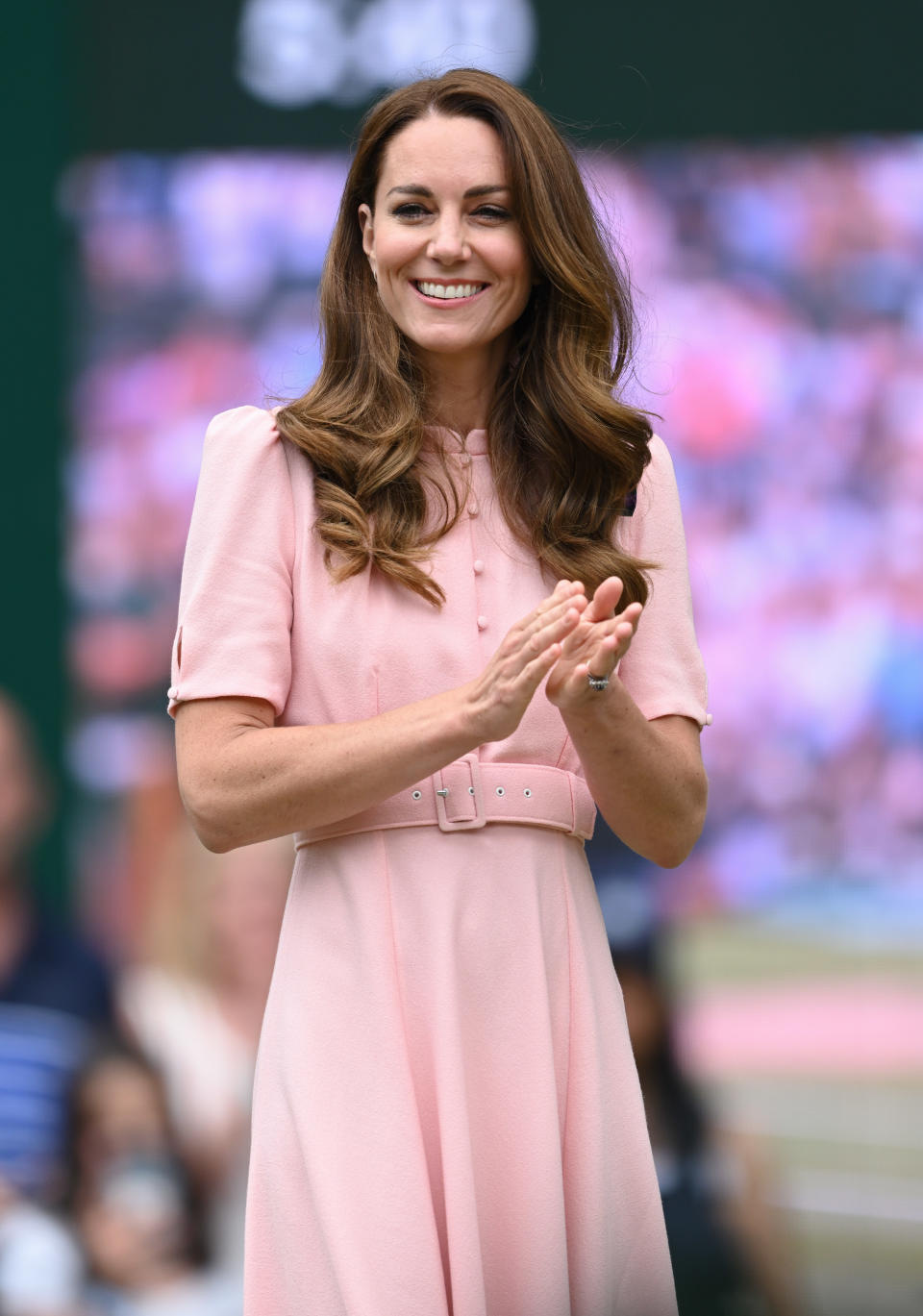 Catherine, Duchess of Cambridge wearing a light pink dress at day 13 of the Wimbledon Tennis Championships at All England Lawn Tennis and Croquet Club on July 11, 2021 in London, England. (Photo by Karwai Tang/WireImage)