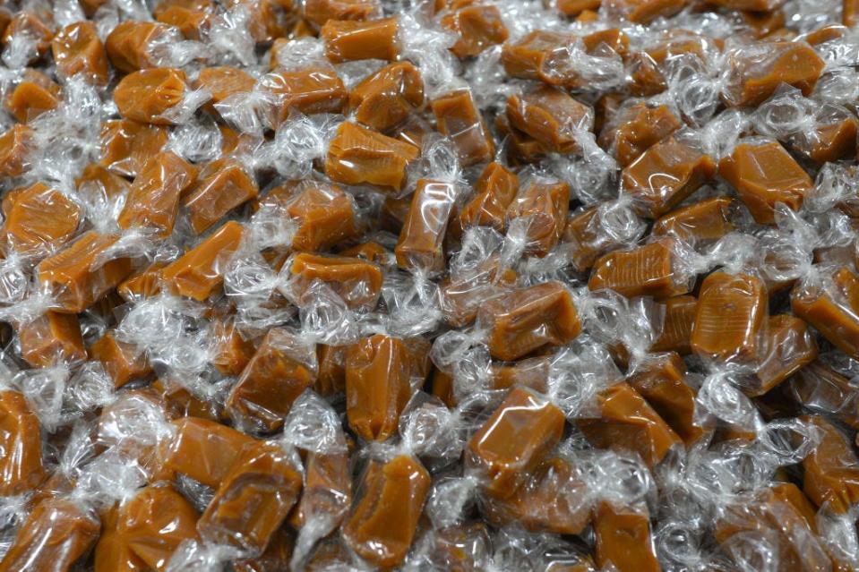 Caramel candies wrapped in plastic.