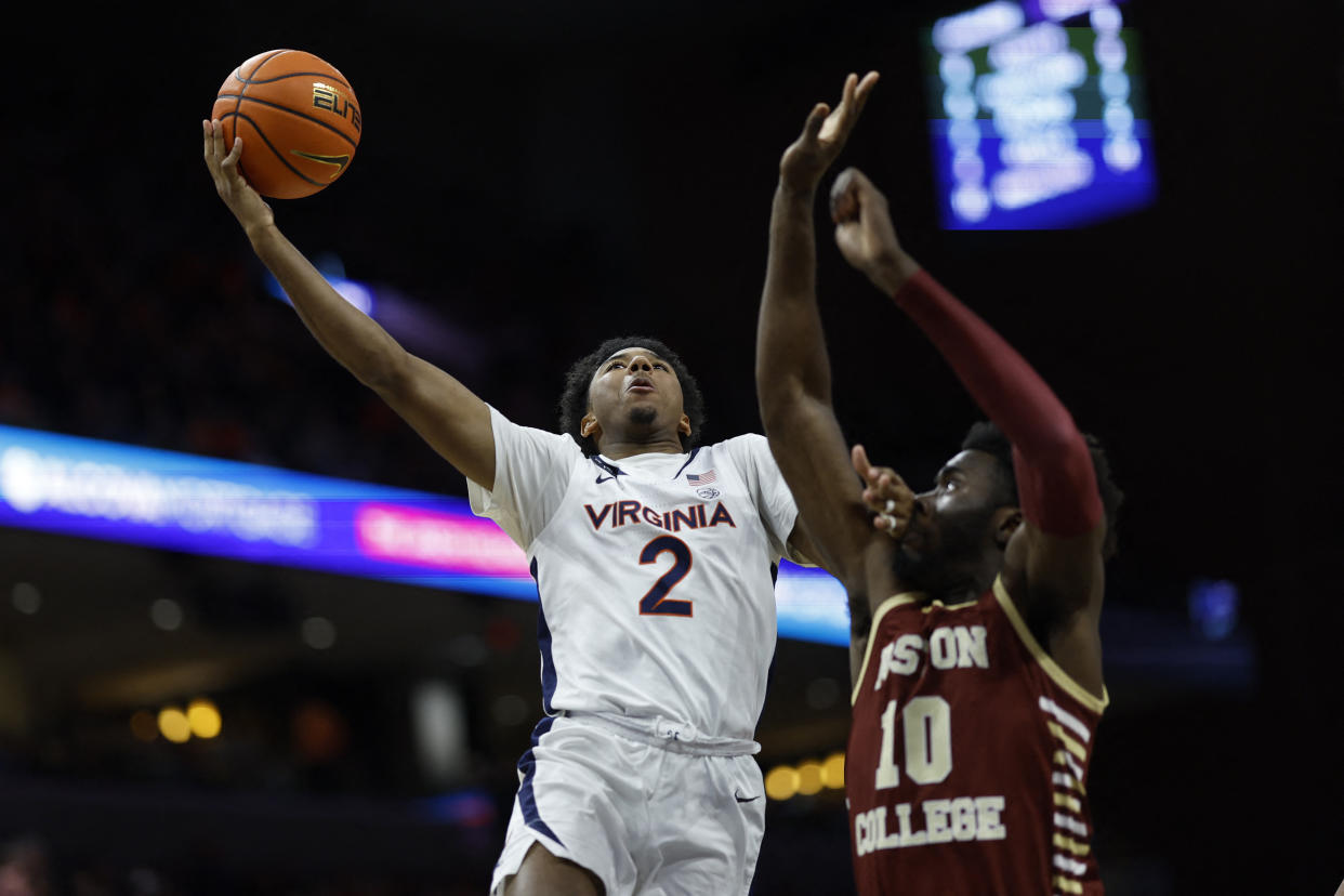 Virginia guard Reece Beekman shoots the ball as Boston College guard Prince Aligbe defends in the second half at John Paul Jones Arena in Charlottesville, Virginia, on Jan. 28, 2023. (Geoff Burke/USA TODAY Sports)