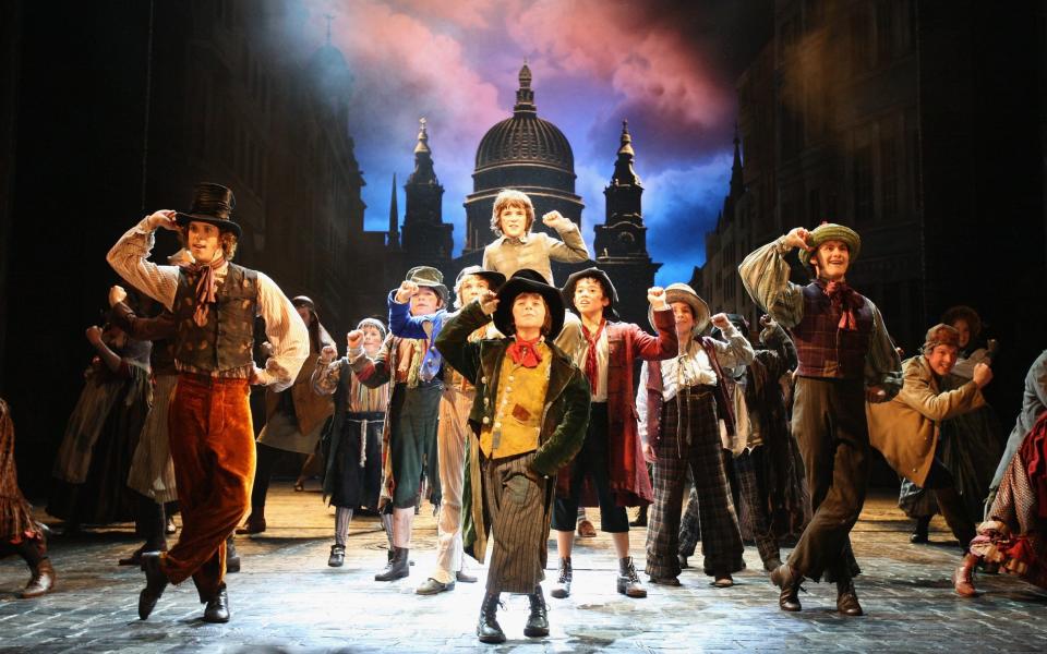 Actors perform on stage during a rehearsal of Lionel Bart's musical adaptation of 'Oliver' at the Theatre Royal, Drury Lane on January 12, 2009 in London - Getty Images