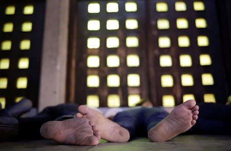 Central American migrants who returned to Mexico from the U.S. sleep outside the Our Lady of Guadalupe Cathedral in Ciudad Juarez