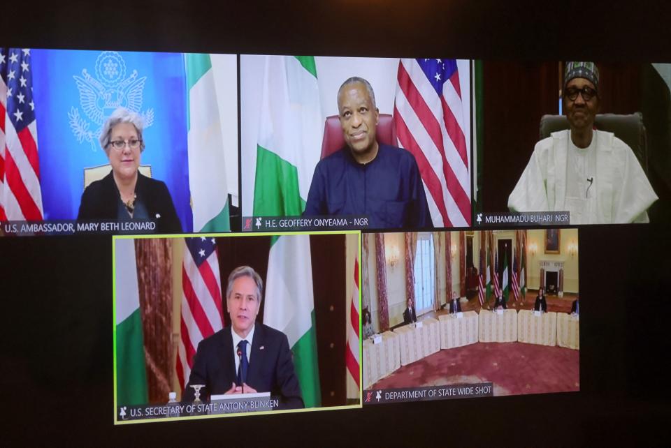 US Secretary of State Antony Blinken and staff members participate in a virtual bilateral meeting with Nigeria's President Muhammadu Buhari during a videoconference at the State Department in Washington, DC on April 27, 2021. - US Secretary of State Antony Blinken on April 27, 2021 cautioned Africa to beware of China's growing role as he vowed a greater US commitment in talks with Nigeria and Kenya. (Photo by LEAH MILLIS / POOL / AFP) (Photo by LEAH MILLIS/POOL/AFP via Getty Images)