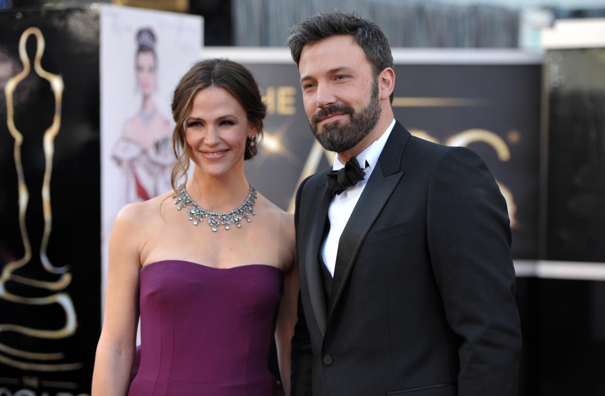 Jennifer Garner is happy to avoid press coverage of herself and ex-husband Ben Affleck (pictured together in 2013). (Photo: John Shearer/Invision/AP)