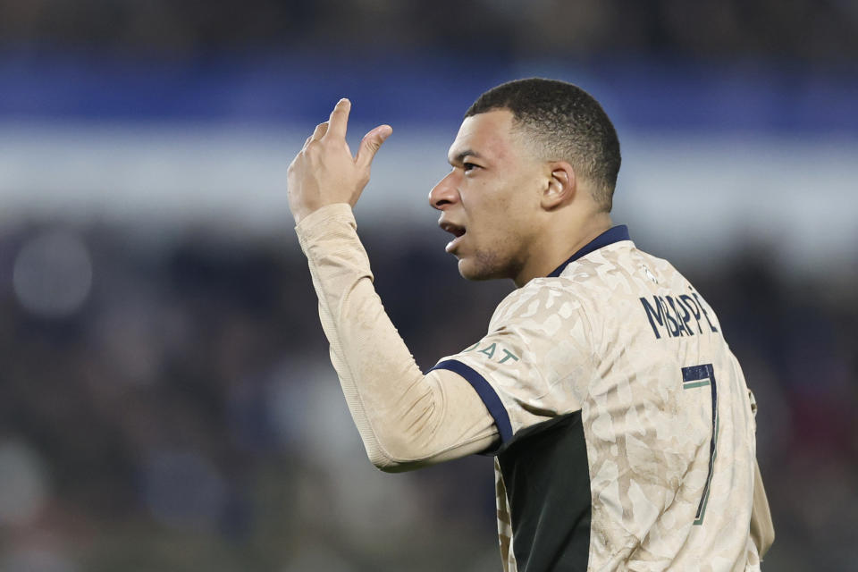 PSG's Kylian Mbappe reacts during the French League One soccer match between Strasbourg and Paris Saint-Germain at Stade de la Meinau stadium in Strasbourg, France, Friday, Feb. 2, 2024. (AP Photo/Jean-Francois Badias)