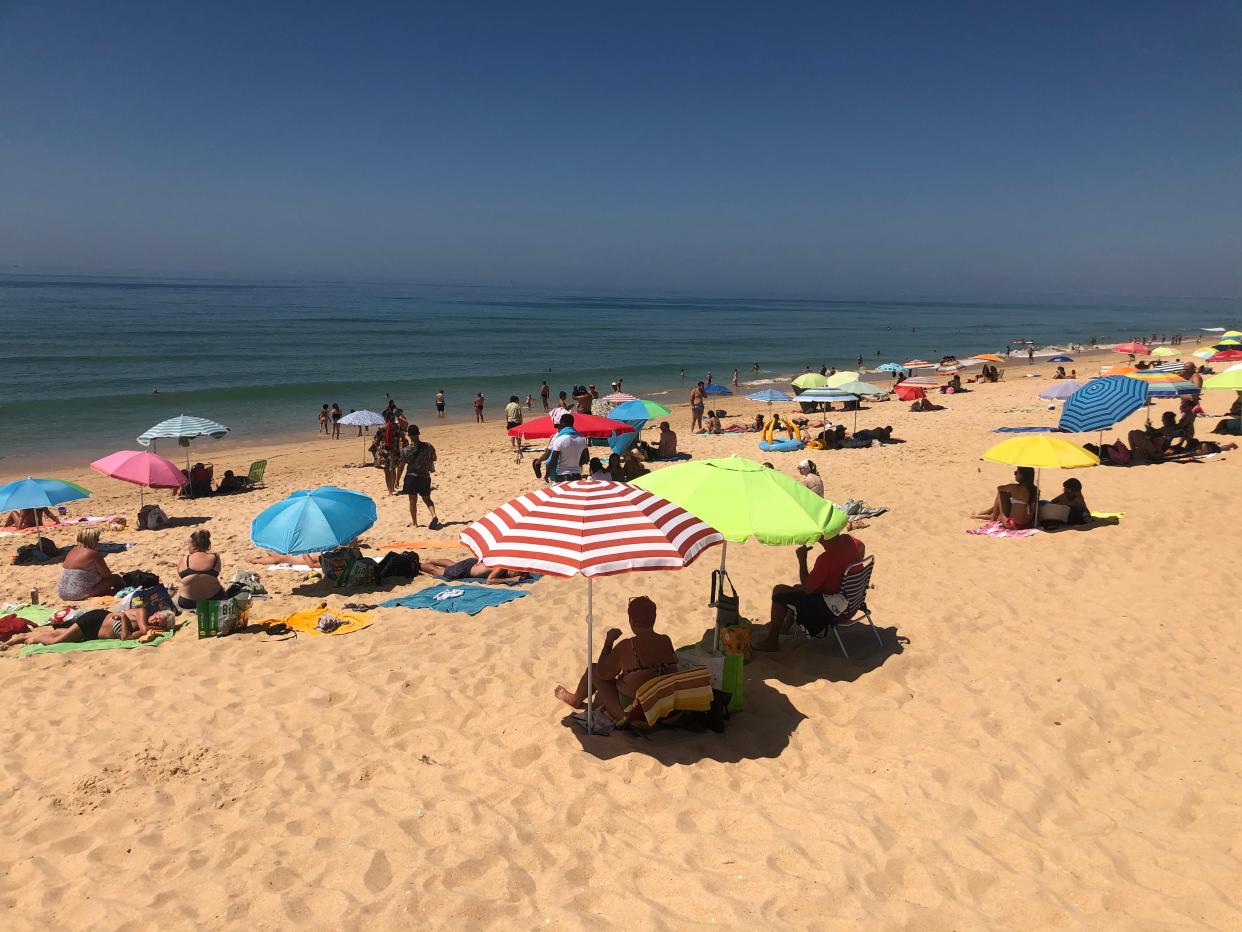 Distant dream: the beach close to Faro airport in Portugal (Simon Calder)