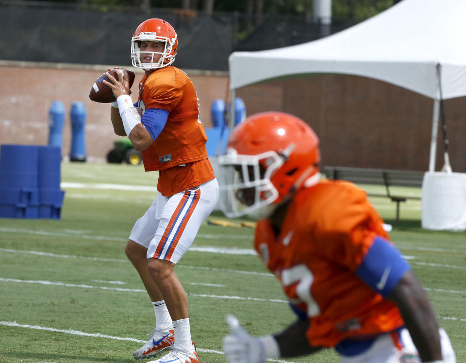 Florida quarterback Feleipe Franks (L) redshirted his first season on campus. (AP)