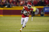 Kansas City Chiefs wide receiver Tyreek Hill (10) scores on a 64-yard touchdown reception during the second half of an NFL divisional round playoff football game against the Buffalo Bills, Sunday, Jan. 23, 2022, in Kansas City, Mo. (AP Photo/Charlie Riedel)