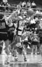 File - Current United Auto Workers President Shawn Fain, is shown driving for a layup as a high school basketball player during a game at Taylor High School in Kokomo, Ind., on Feb. 10, 1987. With roots in small-town Indiana, Fain, now 54, was known as a straight-arrow young man who respected teachers and coaches at Taylor High School, from which he graduated in 1987. (AP Photo via Kokomo Tribune, Paul Sancya, File)