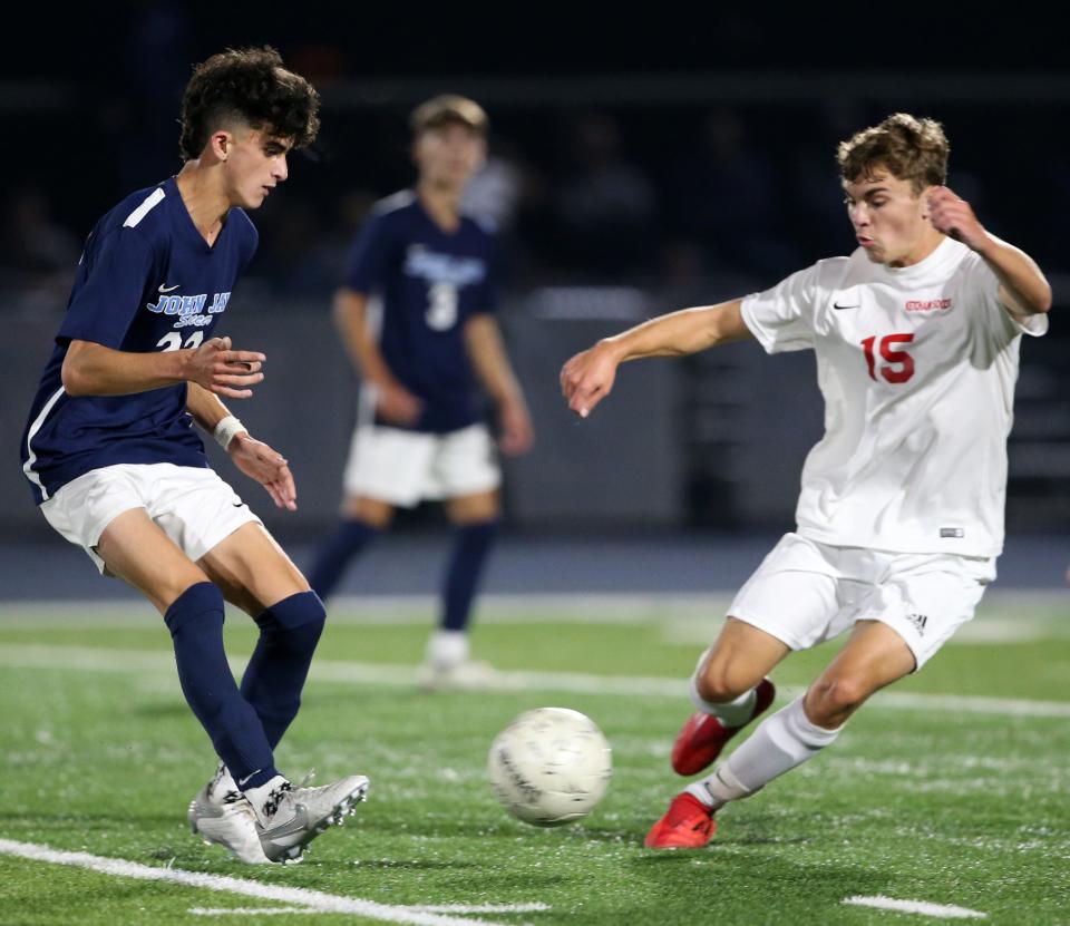 John Jay's Zach Rabadi and Roy C. Ketcham'sFrederick Cornelius III battle for the ball during Wednesday's game on October 13, 2021.