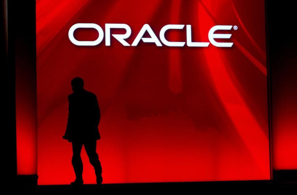 Oracle's then-CEO Larry Ellison walks off stage after delivering his keynote address at the 2008 Oracle OpenWorld conference in San Francisco.