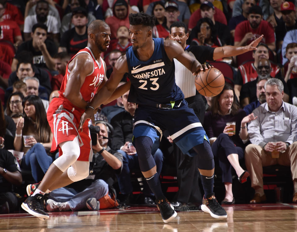 Jimmy Butler works against Chris Paul on Friday night. (Getty Images)