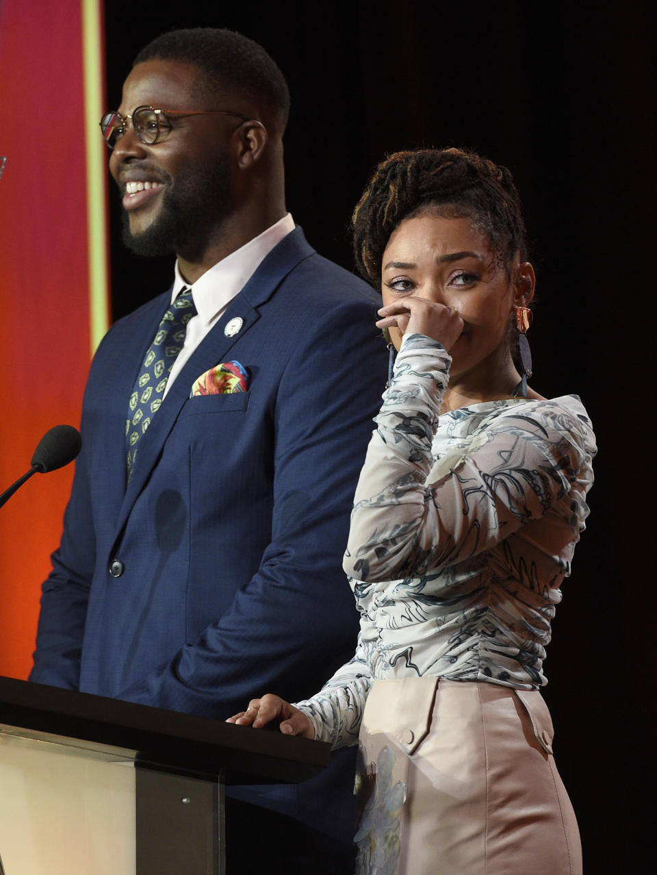 Logan Browning, right, reacts as Winston Duke announces her as a nominee for the 50th annual NAACP Image Awards during TV One's Winter Television Critics Association Press Tour on Wednesday, Feb. 13, 2019, in Pasadena, Calif. (Photo by Chris Pizzello/Invision/AP)