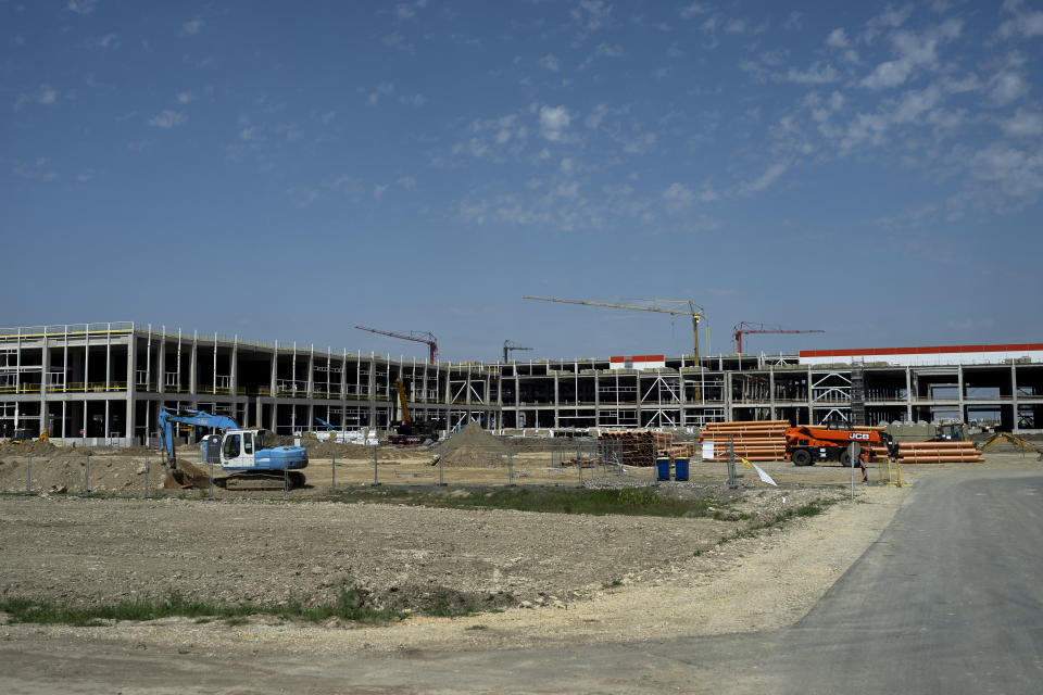 Construction is underway for a battery factory for electric vehicles built by China-based Contemporary Amperex Technology Co. Limited (CATL) in Debrecen, Hungary, Sunday, May 5, 2024. Hungary's government has deepened its economic ties with China, with the proliferation of Chinese electric vehicle (EV) battery factories across the country gaining the most attention. Near Debrecen, construction is underway of a nearly 550-acre, 7.3 billion euro ($7.9 billion) EV battery plant, Hungary's largest-ever foreign direct investment. (AP Photo/Denes Erdos)