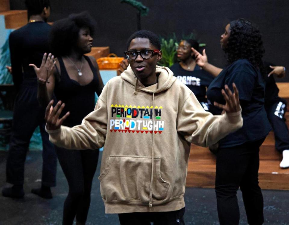 Narrator DeAnthony McGee, 15, speaks during rehearsal for “Bone Soup: A Kwanza Story” at the Jubilee Theatre supported by the Maroon 9 Community Enrichment Organization, an organization that provides after school enrichment youth programs.