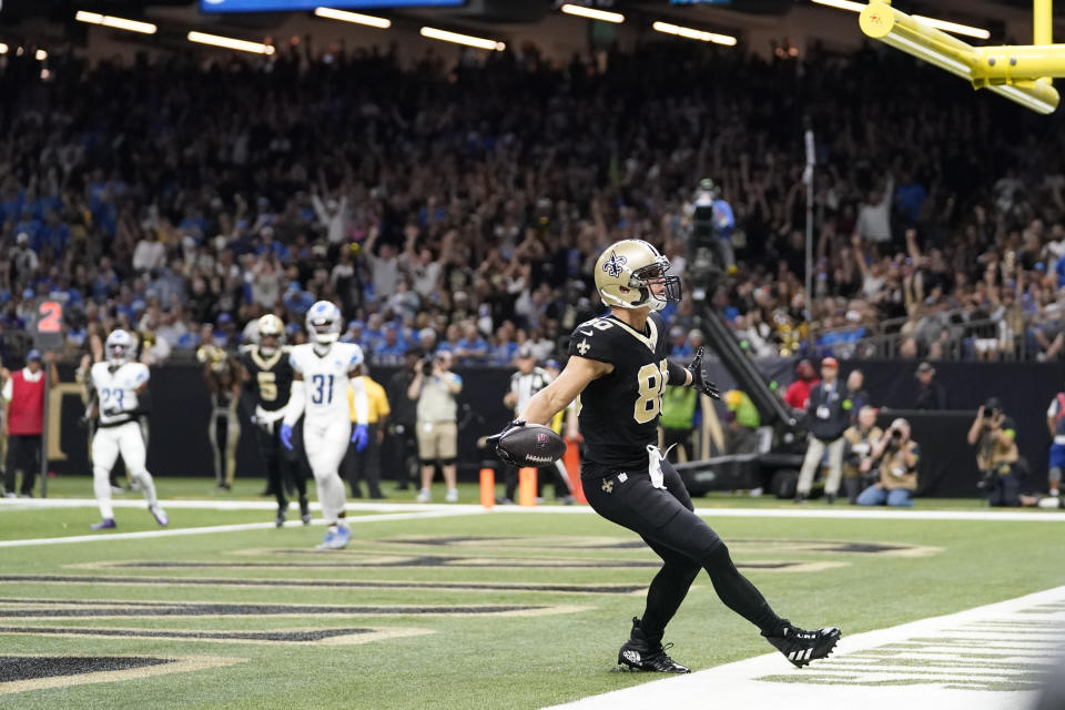 New Orleans Saints tight end Jimmy Graham (80) scores on a 6-yard reception during the first half of an NFL football game against the Detroit Lions, Sunday, Dec. 3, 2023, in New Orleans. (AP Photo/Gerald Herbert)