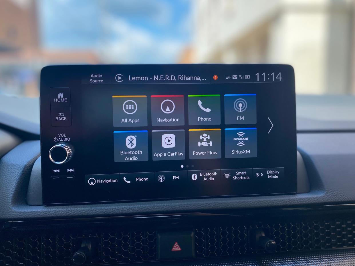 The 9-inch touchscreen running Honda's infotainment system atop the front dash of a 2025 Honda CR-V Hybrid Sport Touring SUV.