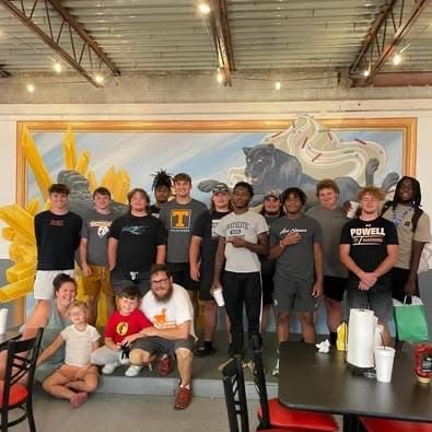 Senior football players at Powell High School were treated to a meal before the official opening of Inskip Grill at Powell.