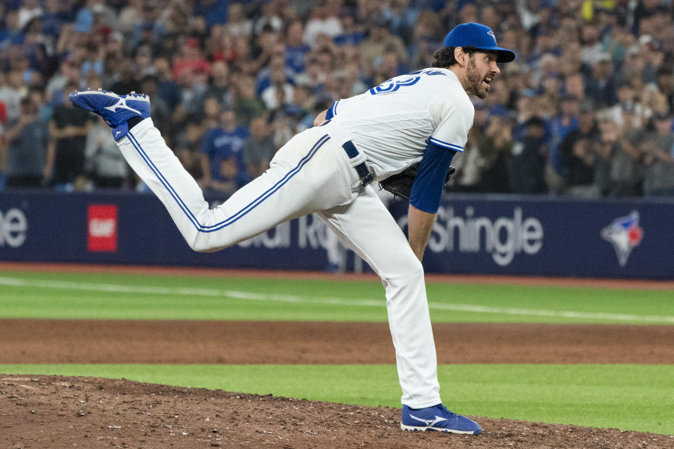 Toronto Blue Jays relief pitcher Jordan Romano works against the Philadelphia Phillies during the ninth inning of a baseball game Tuesday, Aug. 15, 2023, in Toronto. (Nathan Denette/The Canadian Press via AP)