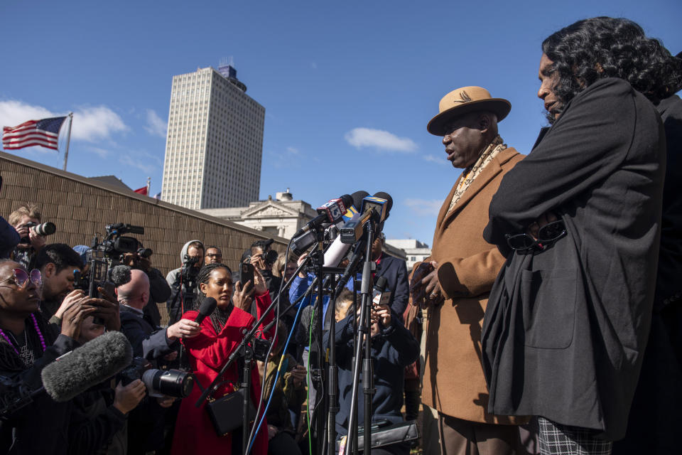 Attorney Ben Crump speaks alongside RowVaughn Wells, the mother of Tyre Nichols, during a press conference after an indictment hearing for five former Memphis police officers charged in the death of Nichols at the Shelby County Criminal Justice Center Friday, Feb. 17, 2023, in Memphis, Tenn. (AP Photo/Brandon Dill)