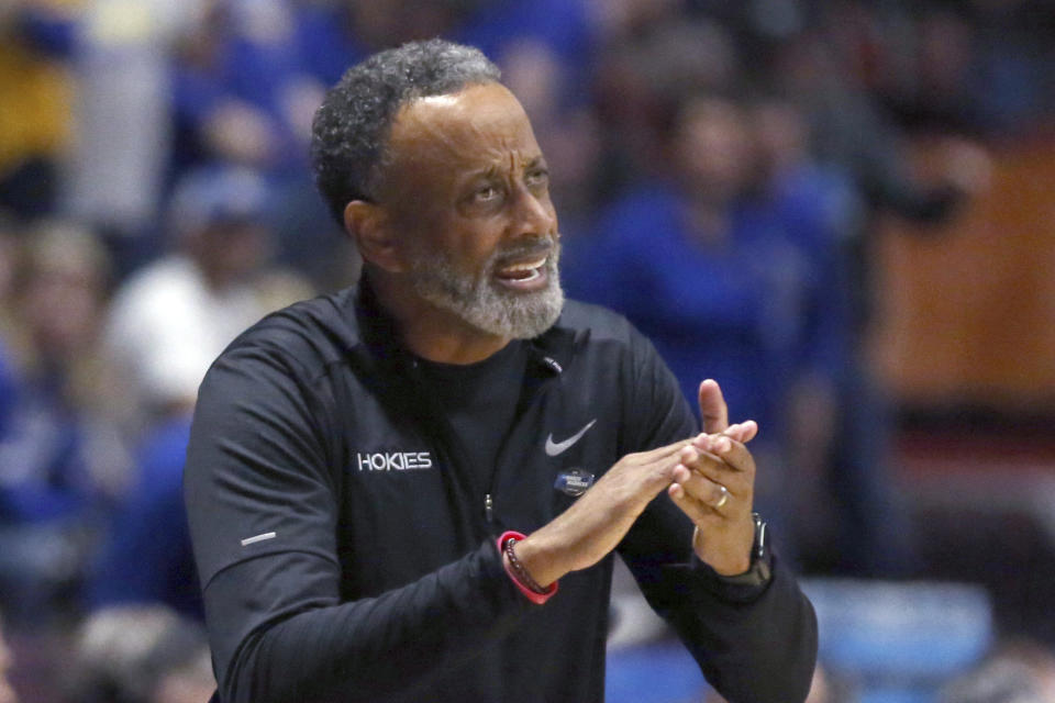 Virginia Tech coach Kenny Brooks watches play during the second quarter of the team's second-round college basketball game against South Dakota State in the women's NCAA Tournament, Sunday, March 19, 2023, in Blacksburg, Va. (AP Photo/Matt Gentry)