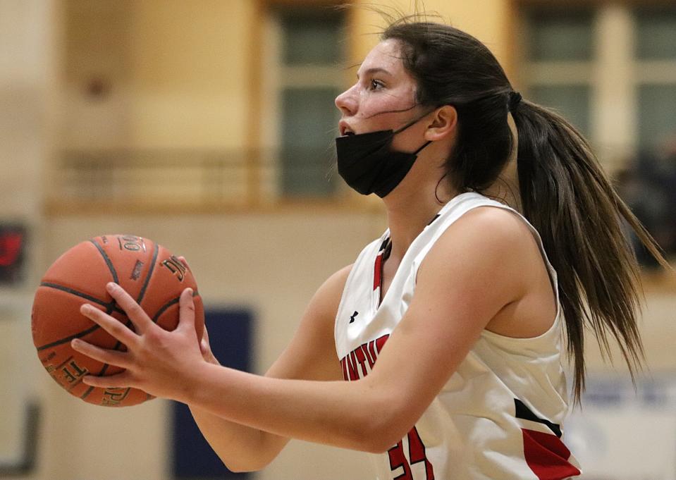 Whitman-Hanson's Abigail Martin prepares to shoot a three-pointer during a game against Hingham at Whitman-Hanson Regional High School on Friday, Jan. 21, 2022.