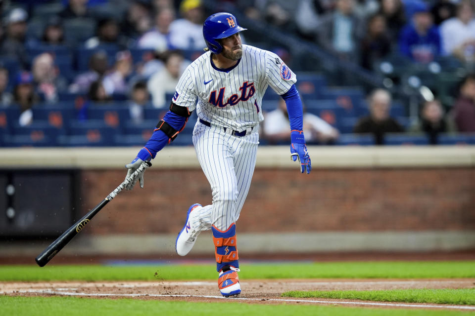 New York Mets second base Jeff McNeil (1) runs to first base after hitting a single during the first inning of a baseball game against the Chicago Cubs, Tuesday, April 30, 2024, in New York. (AP Photo/Julia Nikhinson)