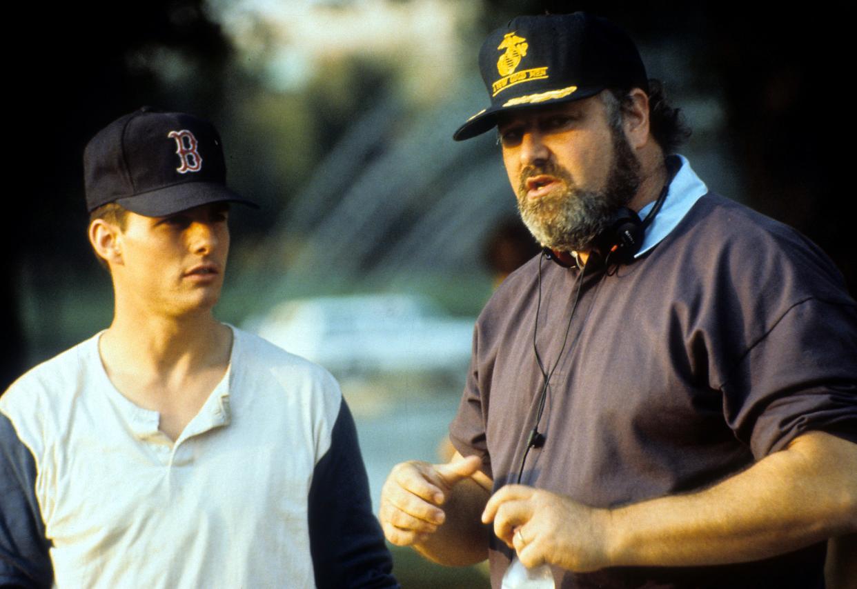 Tom Cruise listening to Director Rob Reiner in between scenes from the film 'A Few Good Men', 1992.