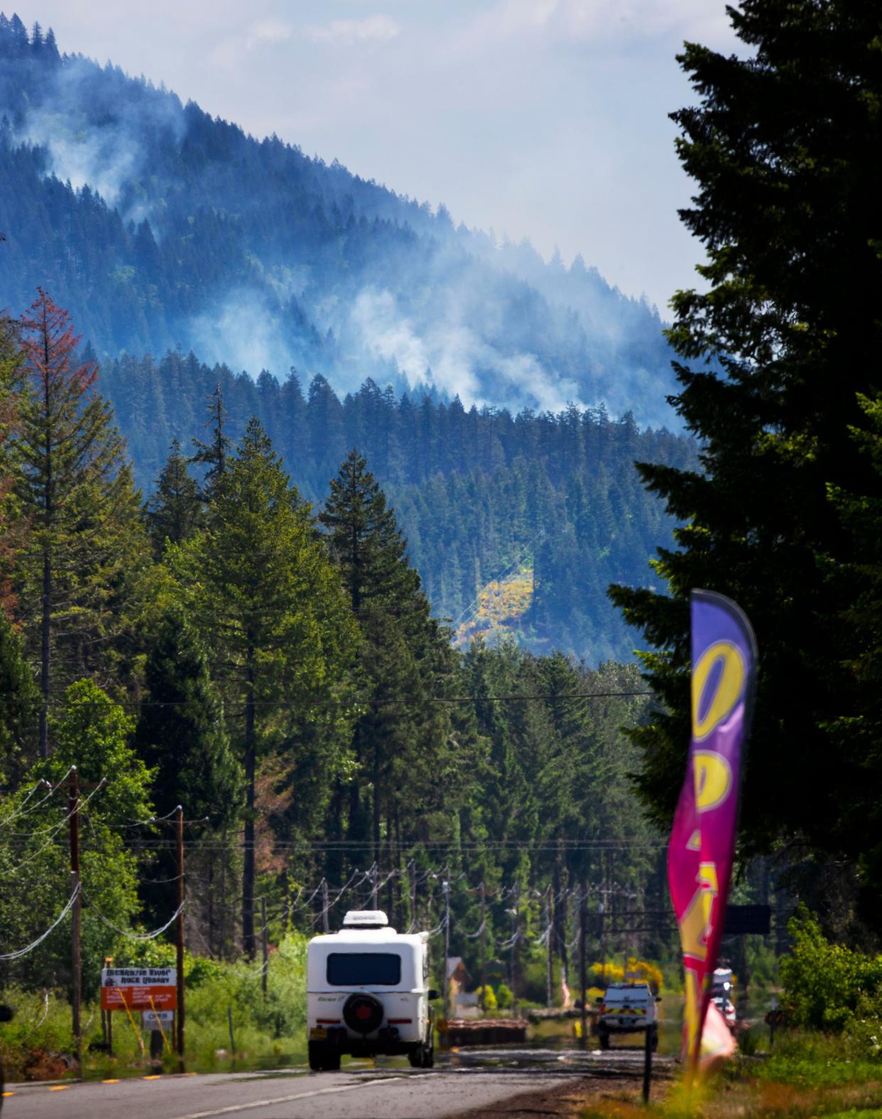 Smoke is seen from the hillside northeast of McKenzie Bridge on Wednesday after a prescribed burn escaped and turned into a 120-acre wildfire in Willamette National Forest.