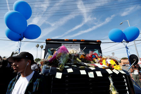 Post-it notes are pictured on a truck as a makeshift memorial for Grammy-nominated rapper Nipsey Hussle who was shot and killed outside his clothing store in Los Angeles, California, U.S., April 1, 2019. REUTERS/Mario Anzuoni