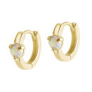 <p>These small opal and 14k gold-plated hoops will go with your favorite blazer as seamlessly as an LBD.</p> <p><strong>Buy It!</strong> Electric Picks, $78; <a href="https://electricpicks.com/collections/earrings-1/products/mystic-hoops" rel="sponsored noopener" target="_blank" data-ylk="slk:electricpicks.com;elm:context_link;itc:0;sec:content-canvas" class="link ">electricpicks.com</a><br><em>Exclusive Discount! Get 20% off this pair with code 'PEOPLE20' through 12/25!</em></p>